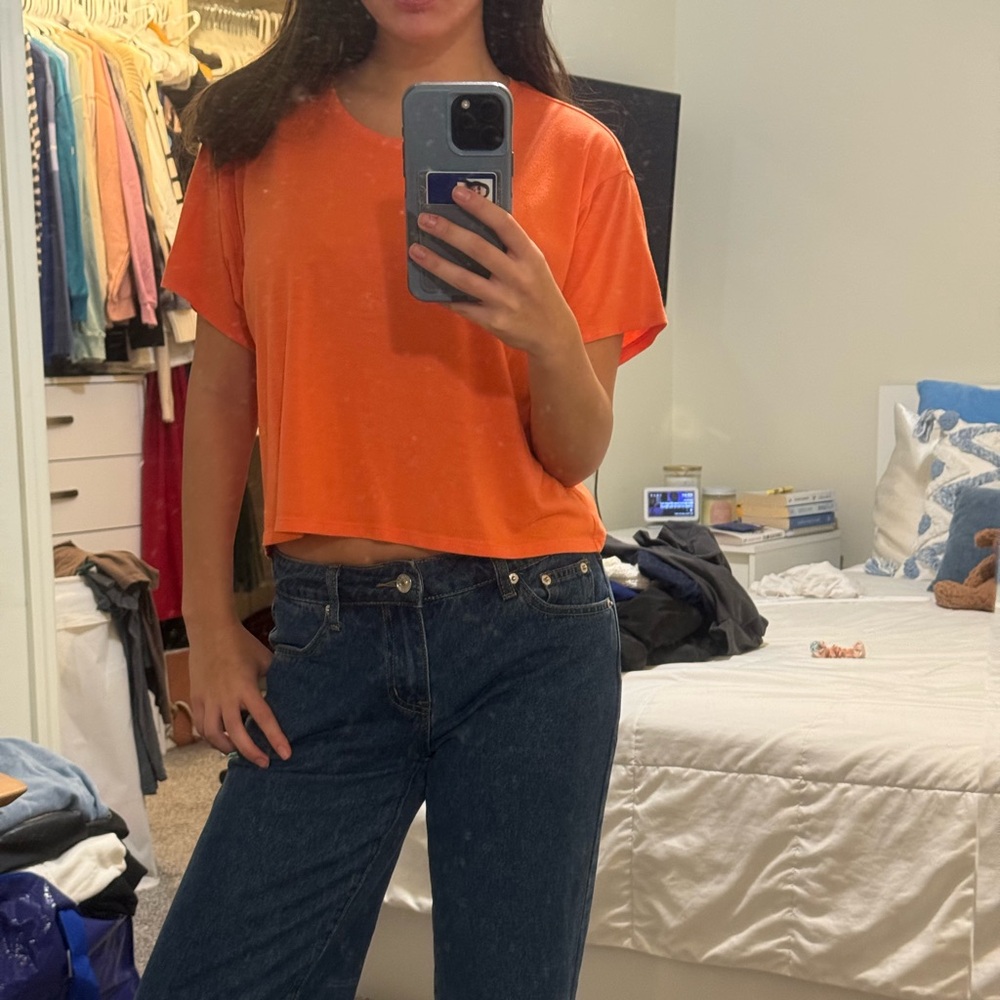 small orange flowy tee